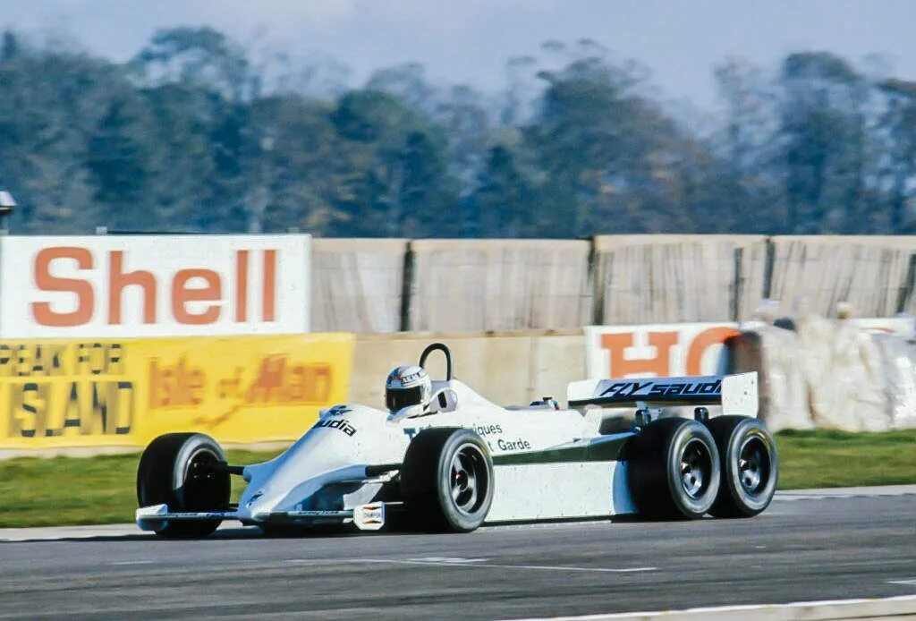 6 ф 7 д. Williams fw07. Болиды ф1 1980. Уильямс формула 1 FW 07. Болид Вильямс ф1 1980.