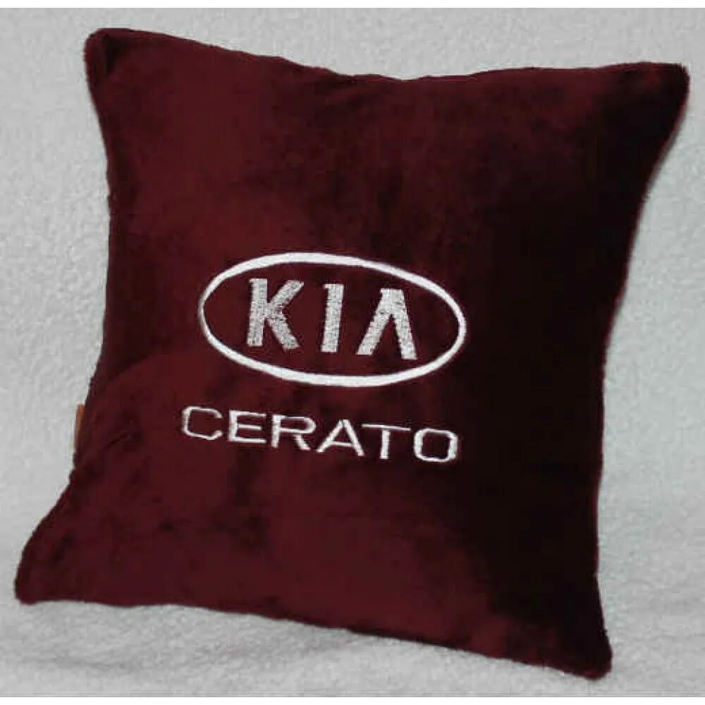 Подушки киа купить. Декоративные подушки для автомобиля. Подушка Kia. Бордовая подушка. Подушка в автомобиль Киа.