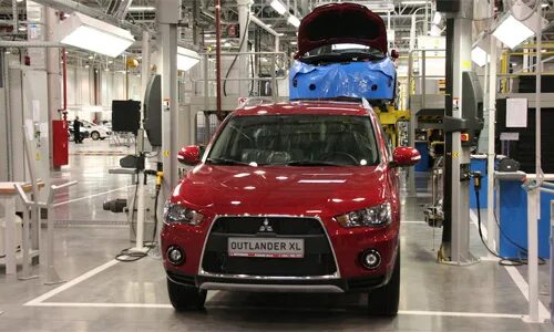 Mitsubishi производство. Автомобиль Митсубиси Аутлендер завод ПСМА рус. Сборка Mitsubishi Outlander на заводе.