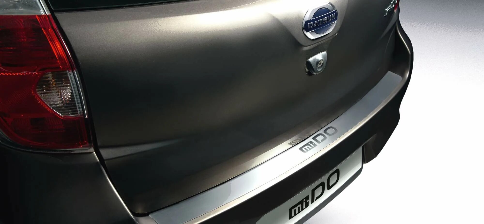 Решетка радиатора datsun mi-do. Накладка на задний бампер датсун он до. Задний бампер datsun парктроник. Решетка бампера датсун он до. Накладка бампера датсун он -до.