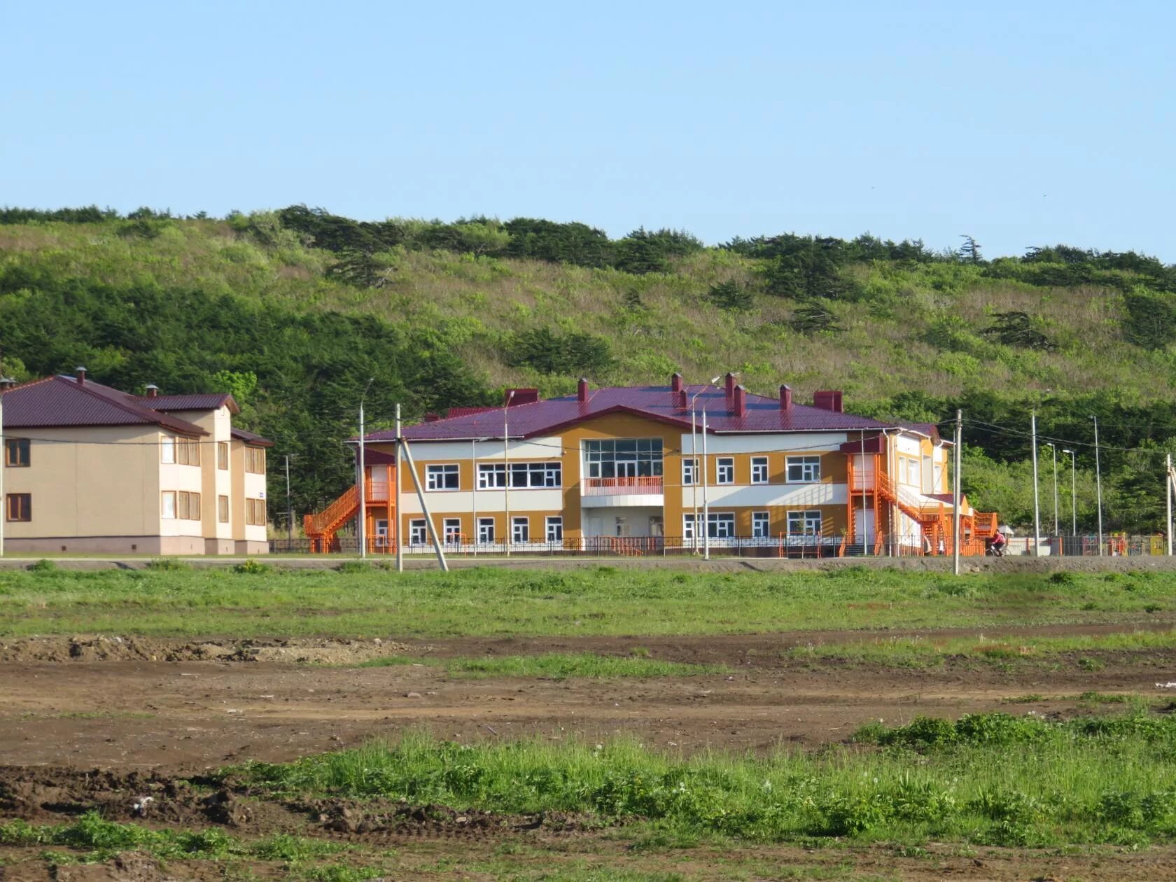 Детский сад курильск. Дши южно-курильск. Садик солнышко южно курильск. Малокурильский дом культуры фото здания. Детский сад аленушка подольск.