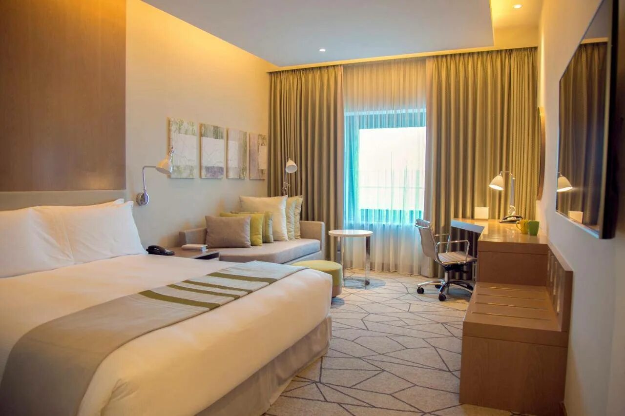 Holiday дубай. Holiday Inn Dubai Festival City 4. Holiday Inn Дубай. Holiday in Dubai отель. Отель Holiday Inn Dubai al Maktoum Airport 4*.