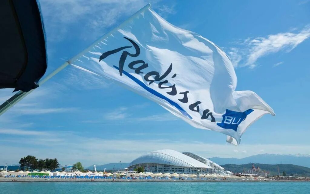 Radisson Сочи лого. Рэдиссон Блю Адлер логотип. Radisson Blu Resort & Congress Centre, Sochi голубая ул., 1а, п. г. т. Сириус. Рэдиссон Адлер голубая 1. Мантера конгресс сочи