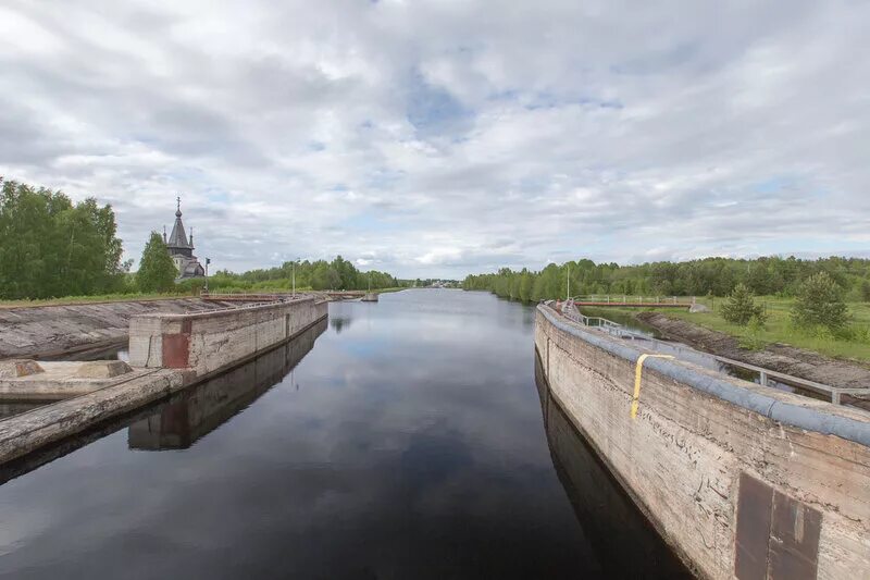 Строительство беломоро балтийского канала. Беломорско-Балтийский канал. Повенчанская лестница Беломорско-Балтийский канал. Плавучий док через Беломоро Балтийский канал. Беломорский канал здание.