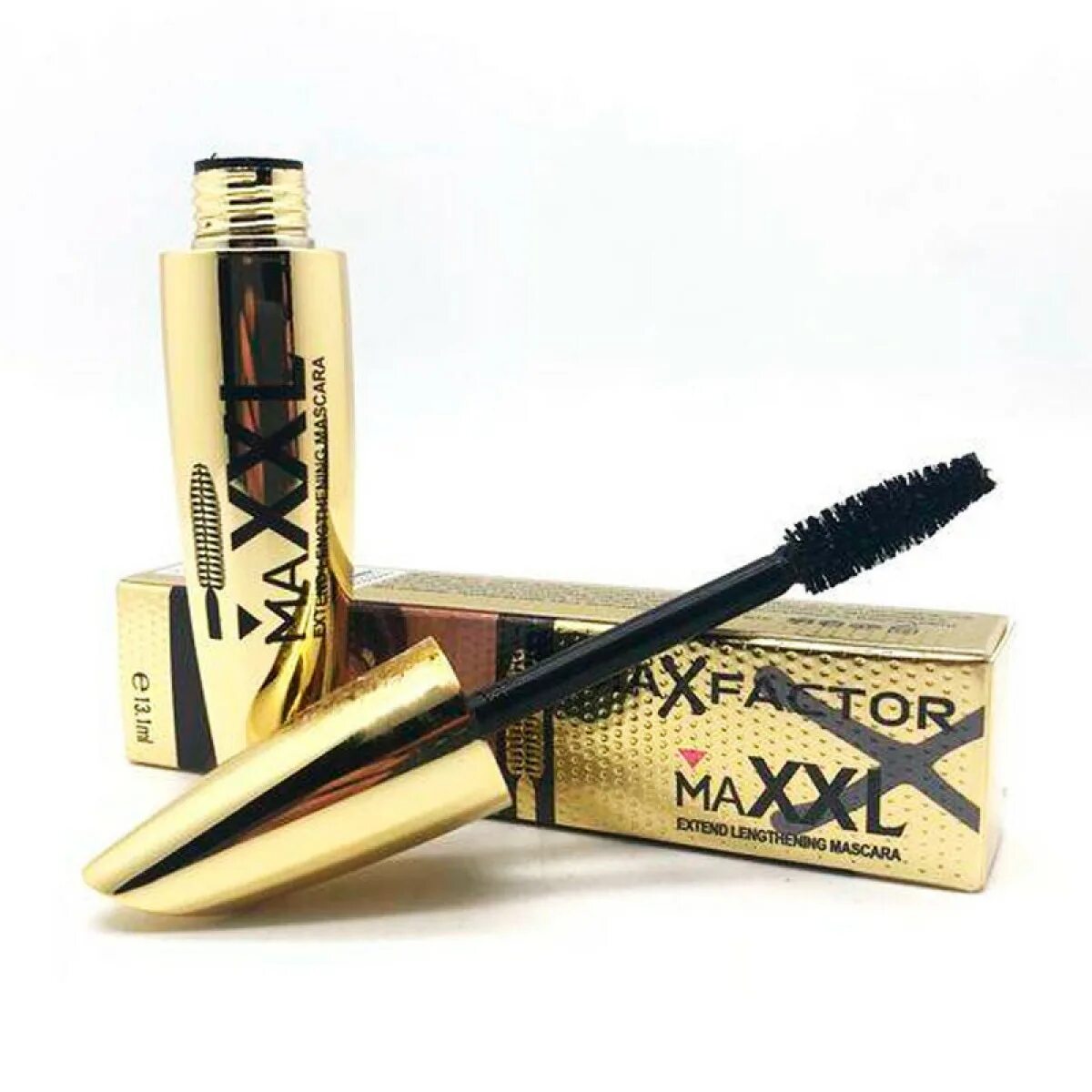 Тушь черно золотая. Тушь Макс фактор ххл. Max Factor MAXXL extend Gold. Max Factor XXL тушь. Тушь Kiss MAXFACTOR bushy Dazzling.