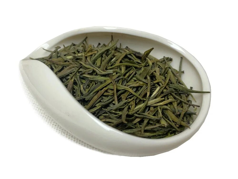 Где купить китайский чай. Цзюнь Шань Инь Чжень. Цзюнь Шань Инь Чжэнь чай. Цзюнь Шань Инь Чжень, «серебряные иглы с государевой горы». Цзюань Шань Инь Чжэнь зеленый чай.