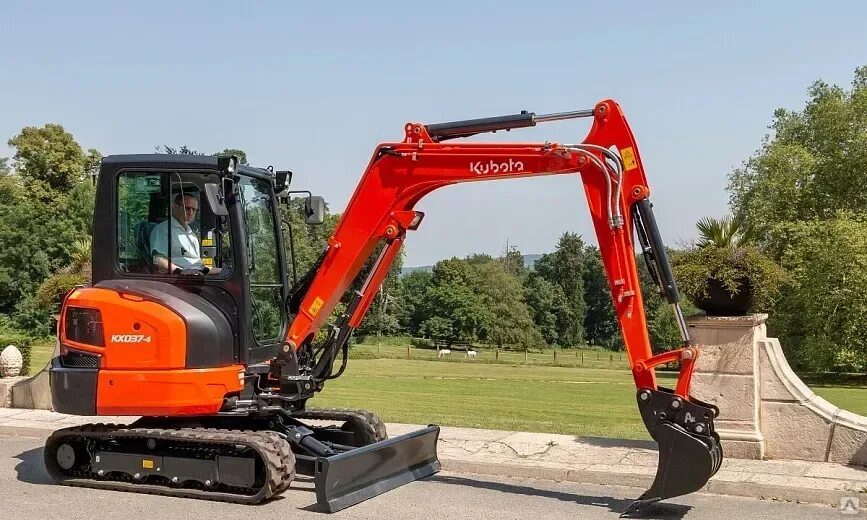 Kubota kx037. Мини экскаватор Kubota. КХ 037.4 Кубота гидромолот. Экскаватор Kubota kx057-4. Мини экскаватор 319