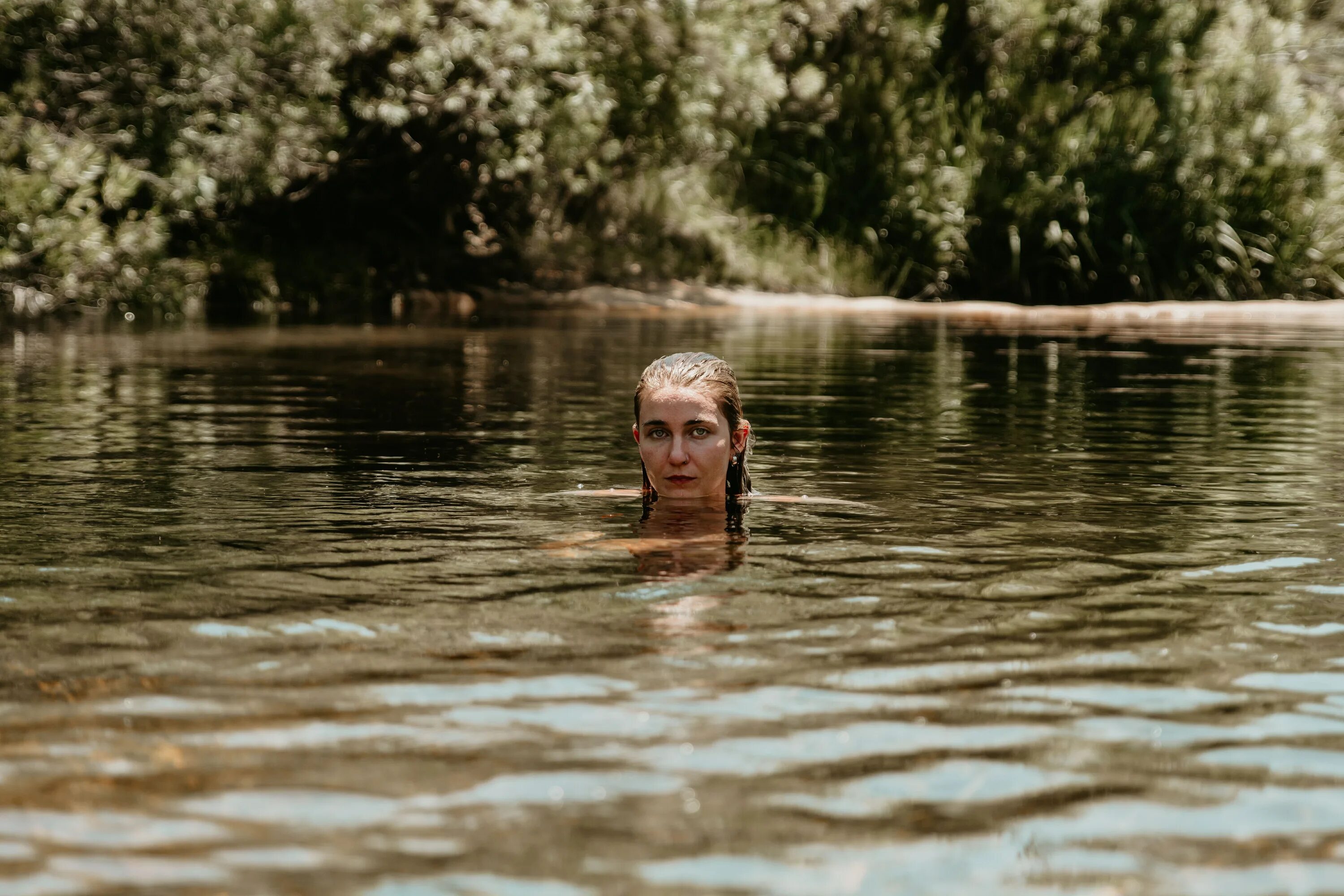 River swimming. Women swimming in River. Swim in the River. Reach the other Side of the River in swimming.