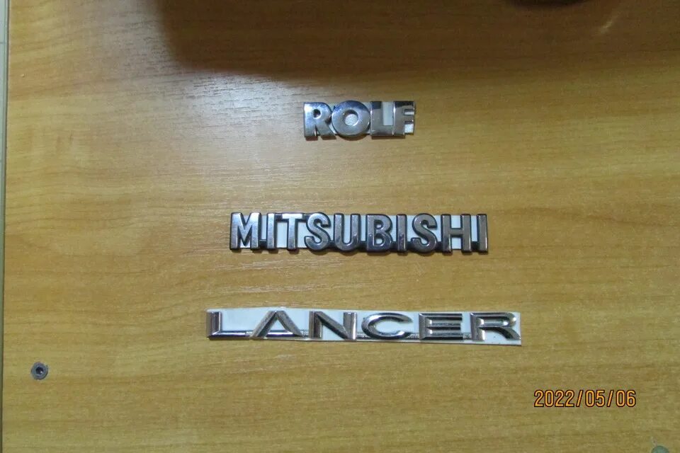 Лансер 9 универсал шильдик. Шильдик lancer. Шильдик лансер 10. Шильдик mitsubishi. Шильдик митсубиси лансер 10.