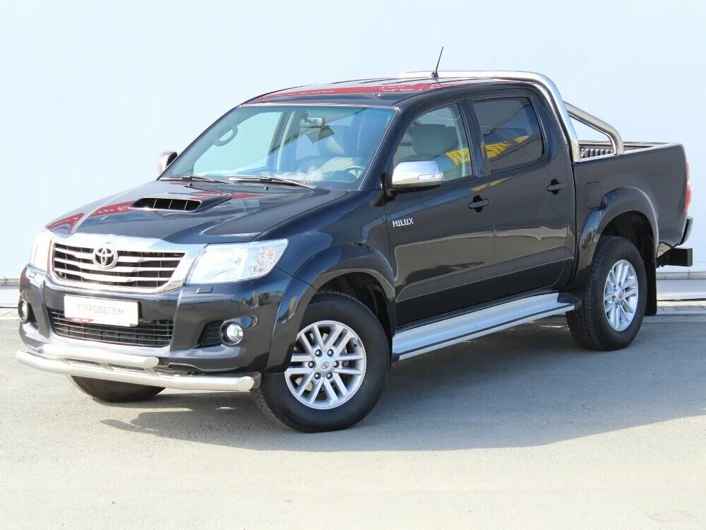 Toyota hilux vii рестайлинг. Тойота хайлюкс бу москва. Тойота пикап хайлюкс 2013. Тойота хайлюкс 2012г. Тойота хайлюкс 2014 серая.