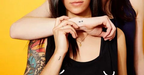 Girl getting tattoo
