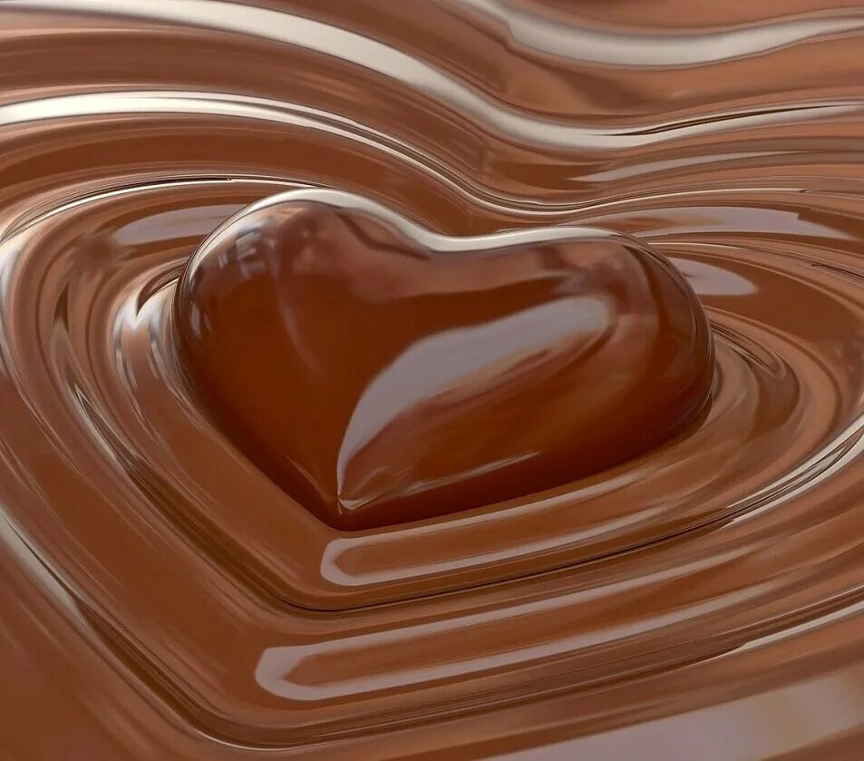 Растаявший шоколад. Шоколад. Жидкий шоколад. Расплавленный шоколад. Шоколадный фон.