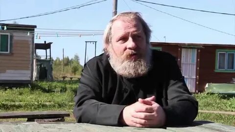 Священник садится