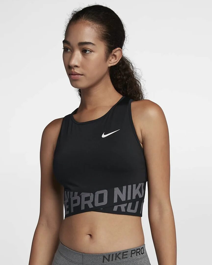 Спортивные nike женские. Nike Pro Intertwist майка. Womens femme Nike топ. Nike Pro Nike это. Майка Nike Pro Tank женская черная.