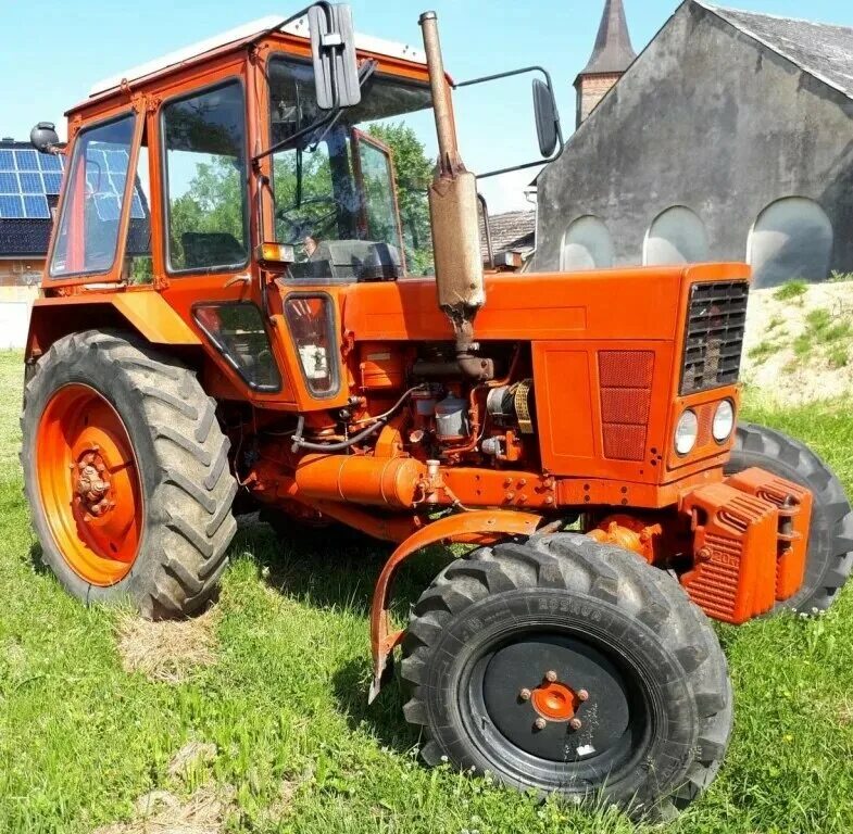 Купить трактор новгород. Трактор МТЗ 82. МТЗ 82 оранжевый. МТЗ-80 трактор оранжевый. 999 МД сельхозтехника МТЗ 80-82.