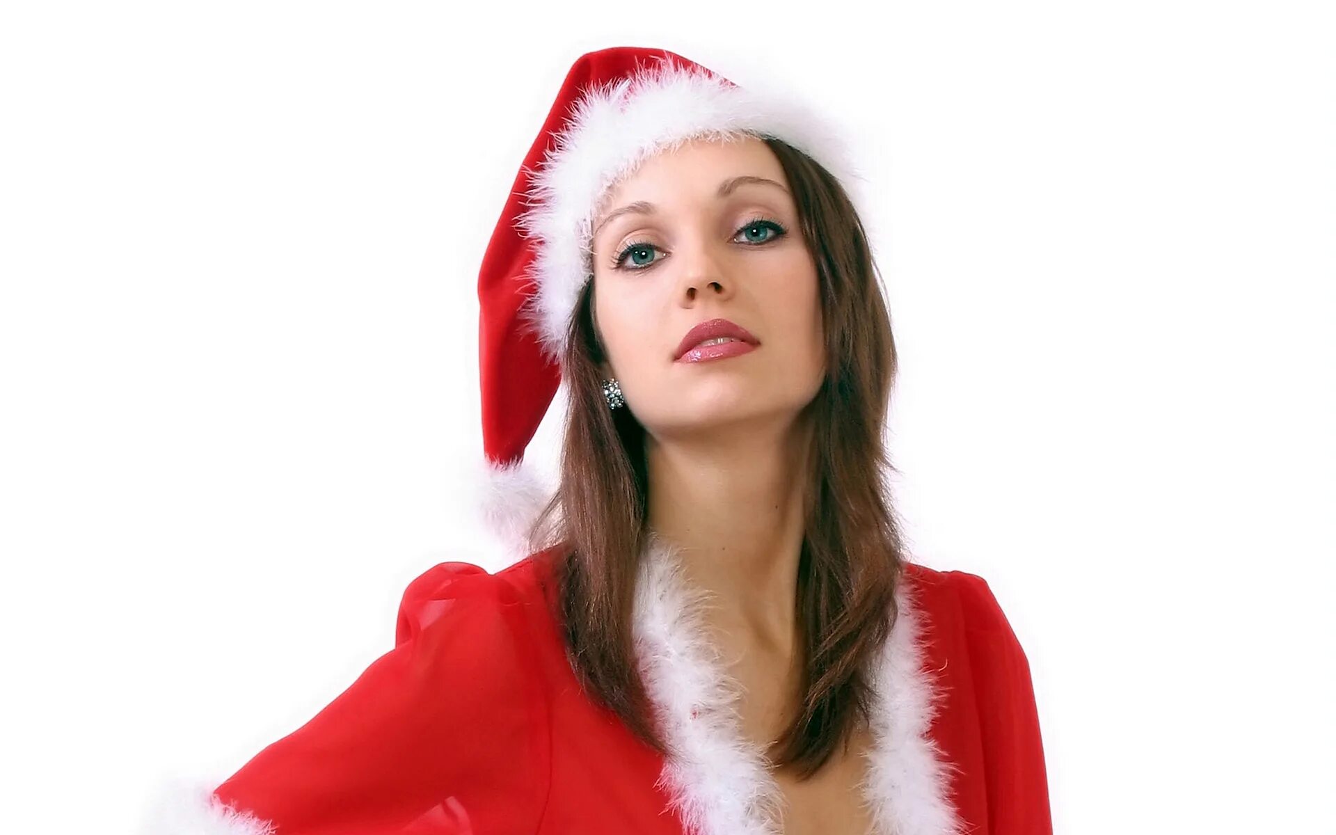 девушка в новогодней шапке. женщина снегурочка. новогодние девушки. красивая девушка в новогоднем колпаке. снегурочки.