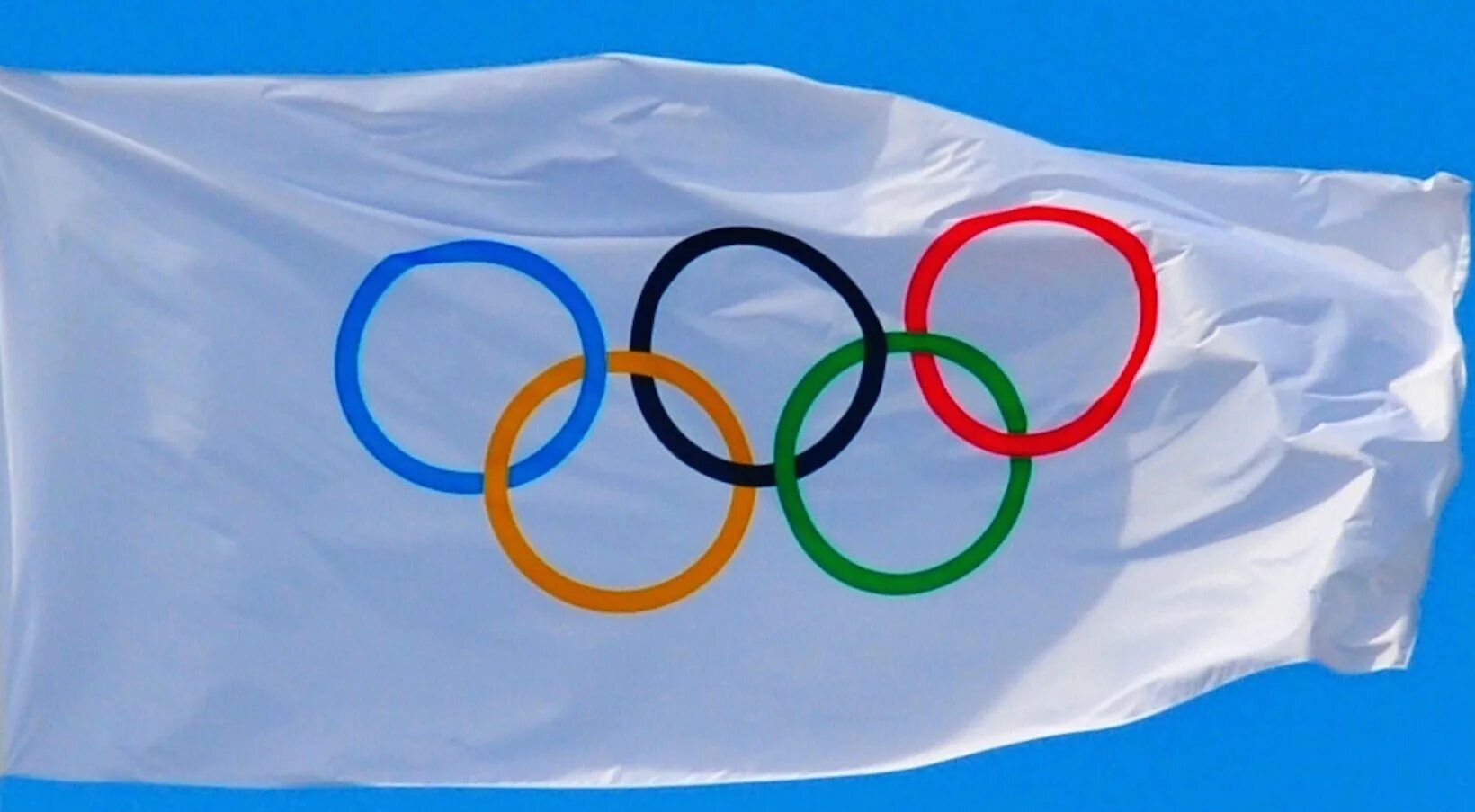 Флаг российского олимпийского. Флаг Олимпийских игр 1914. Олимпийский флаг 2021. Олимпийский флаг Токио. Олимпийский флаг в Японии.