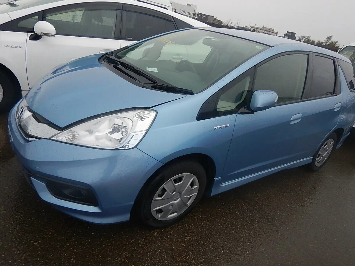 Honda Fit Shuttle Hybrid 2015. Honda Fit Shuttle. Хонда фит шаттл гибрид 2014. Хонда фит шаттл 2015 Hybrid. Фит гибрид 2014