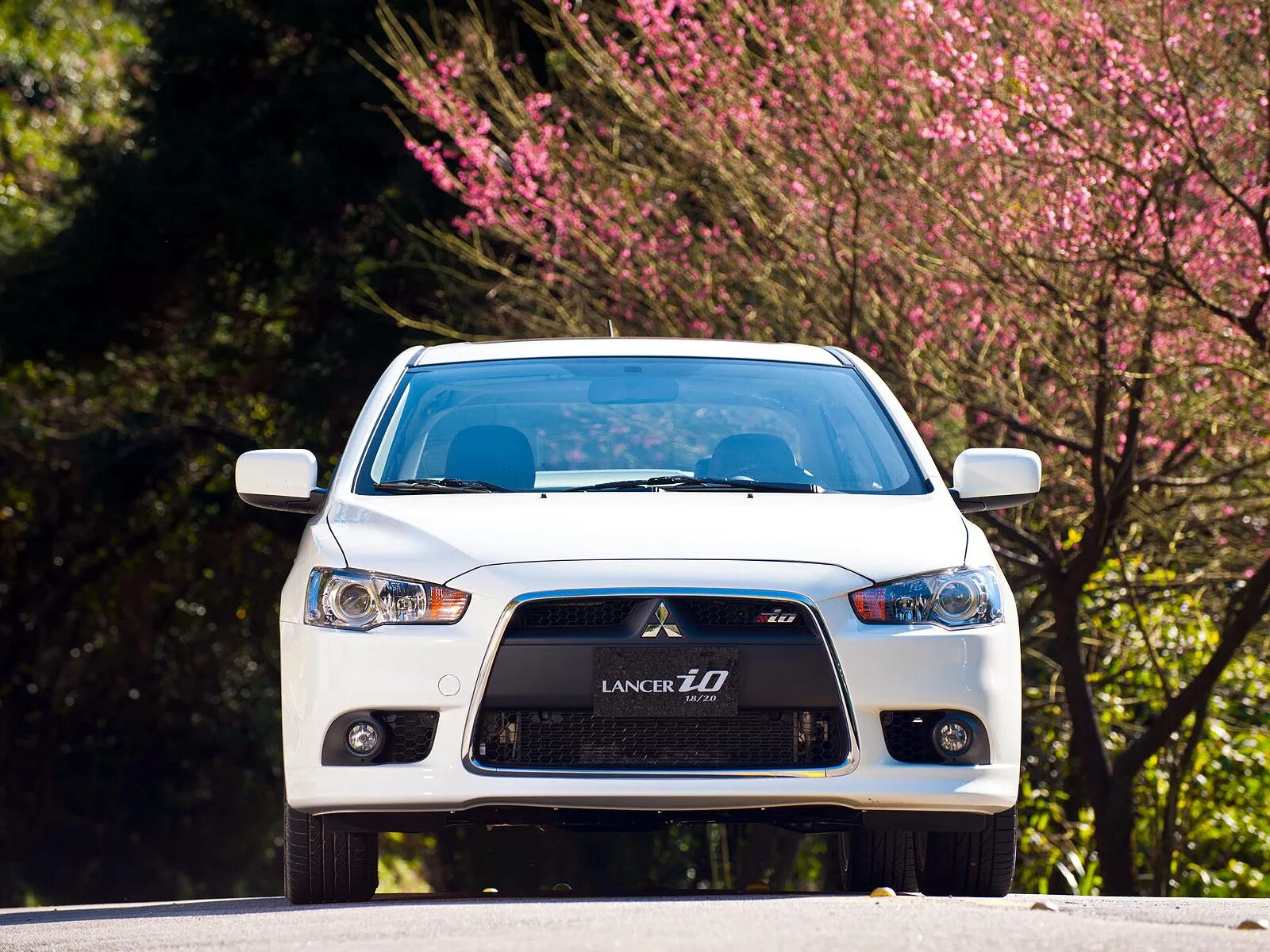 Mitsubishi car. Митсубиси Лансер 2012. Mitsubishi Lancer Evolution x 2012. Lancer EVO 2012. Lancer x 2012.