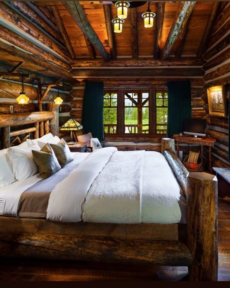Image may contain: bedroom and indoor Log home interiors, Rustic house, Cozy cab