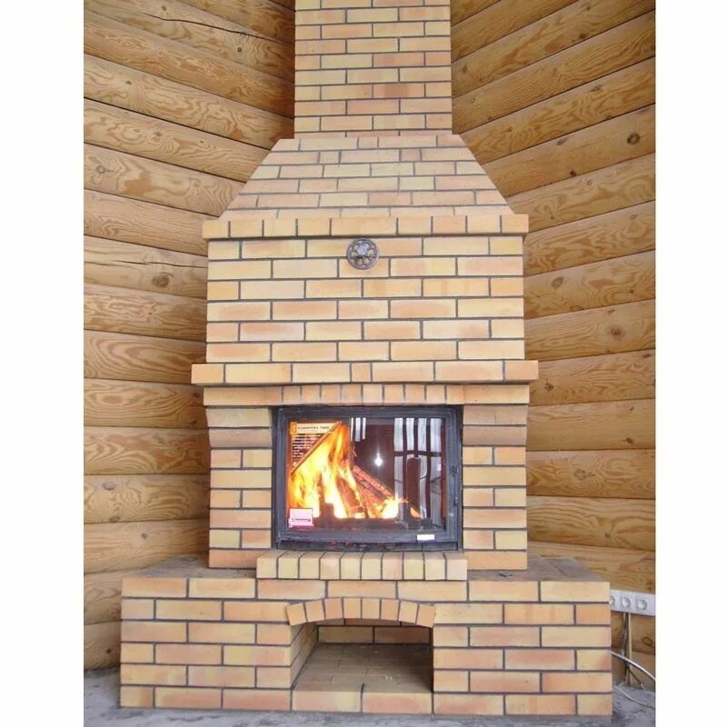 Кирпичный камин в интерьере. Камин с чугунной топкой. Кирпич топка. Кирпичная топка обкладка. Печь с каминной топкой.