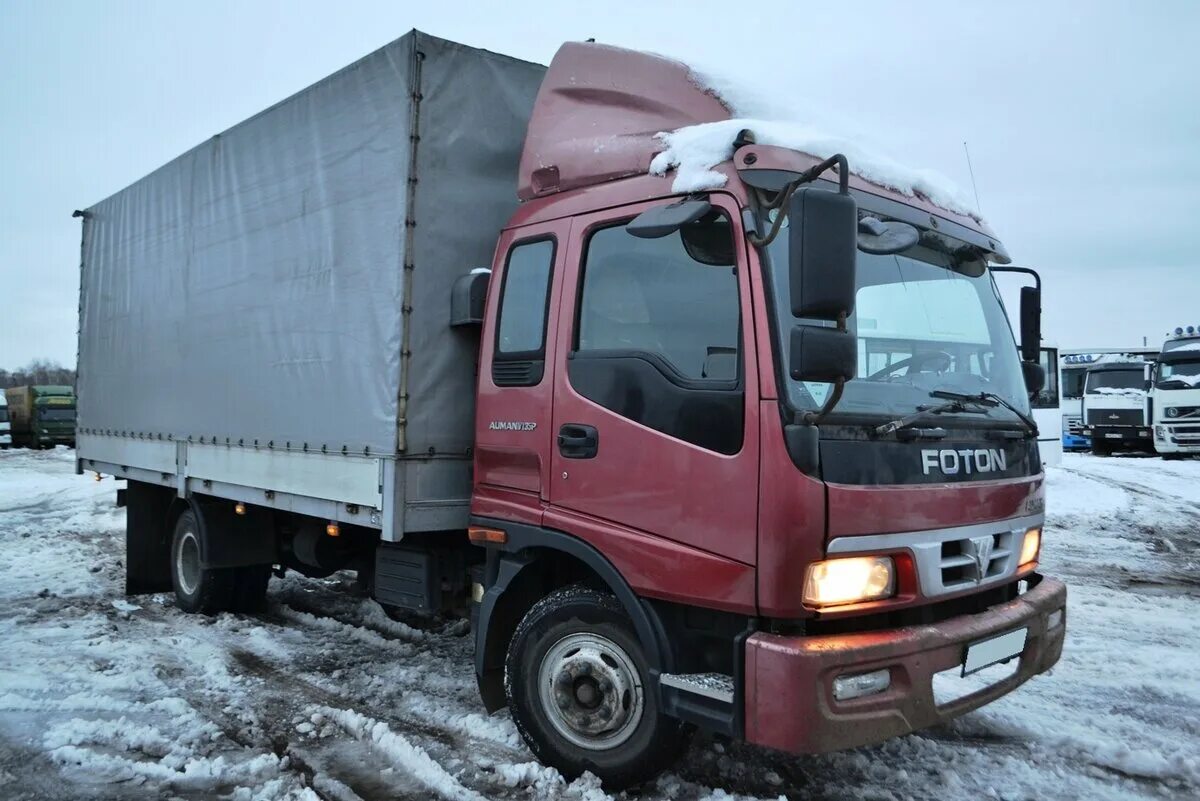 Фотон ауман бу. Фотон ауман bj5122. фотон auman 1126. фотон ауман 2012. foton 5122 тентованный.