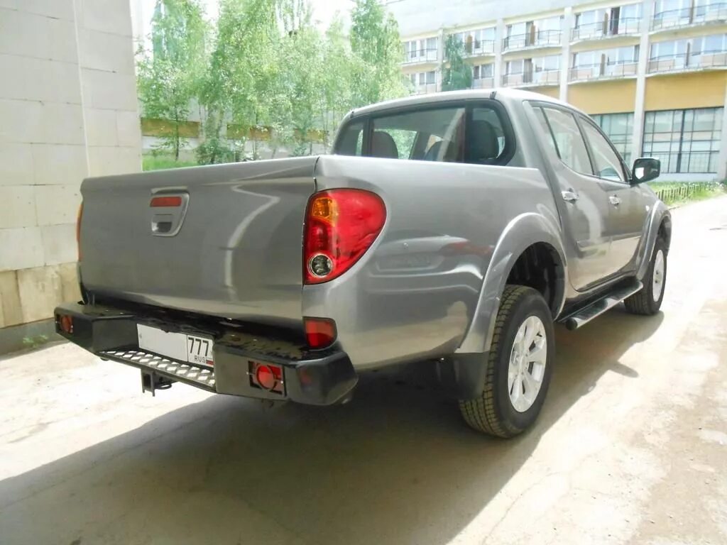 Бампера mitsubishi l200. Задний бампер Митсубиси л200. Задний бампер l200 2008. L200 2021 задний бампер. Задний бампер на l200 Мицубиси.