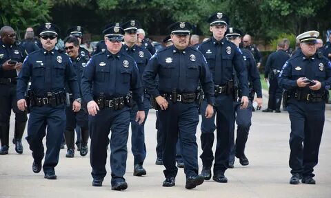 Policeman walk