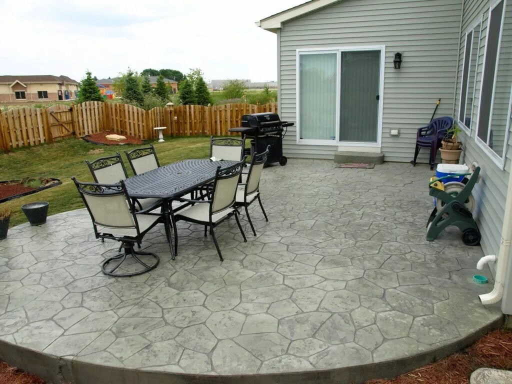 Бетон во дворе частного дома фото Stamped patio w/ 2 sets of landings/steps w/ matching brick borders & facing on