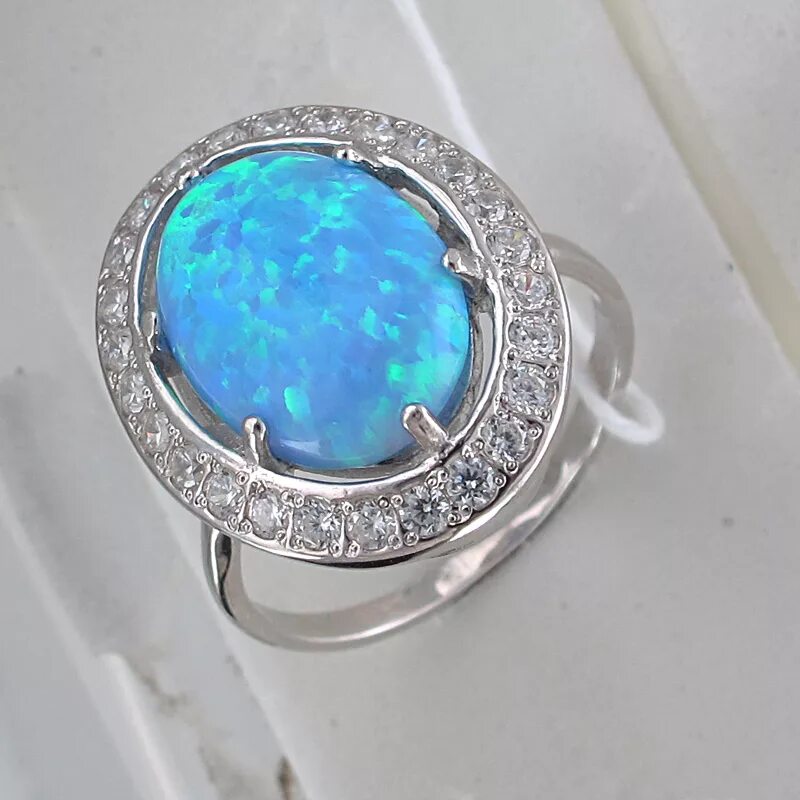 Кольцо велес с опалом. Кольцо с опалом в серебре. Серебряные кольца опалами. Кольцо спайкс с опалом. Серебряные кольца опалами.