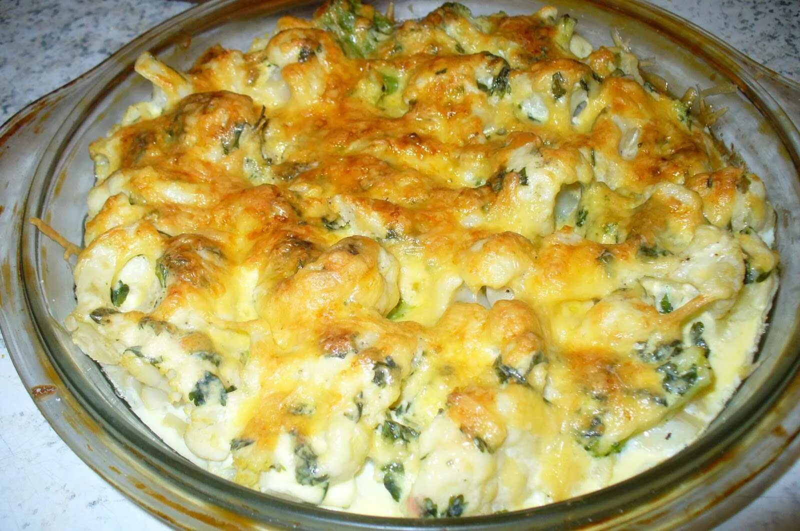 Вкусно приготовить цветную капусту с сыром. Цветная капуста запеченная с сыром. цветная капуста запеченная в духовке. капуста запеченная с сыром. блюда из цветной капусты в духовке.