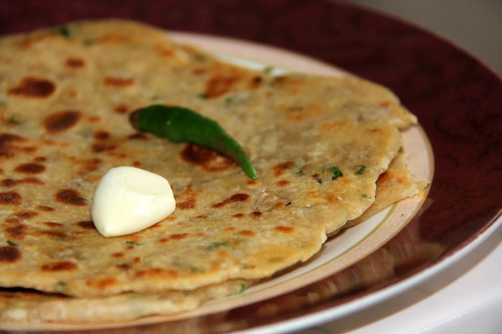 Индийская роти. Паратха-индийские лепешки. Paratha лепешки. Индийский хлеб паратха. Индийские лепешки чапати.