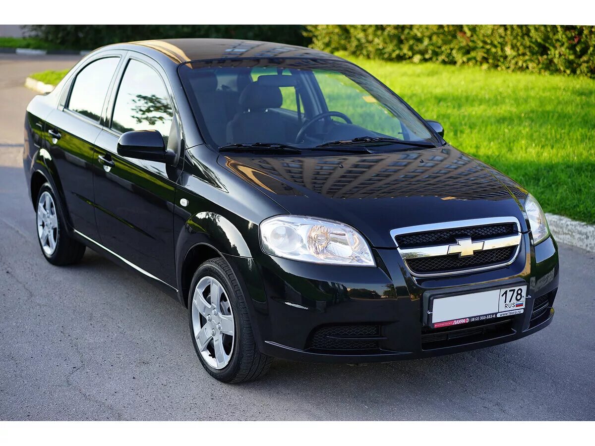 Шевроле авео поколения. Chevrolet Aveo 2011. Chevrolet Aveo 2011 черный. Шевроле Авео 1 Рестайлинг. Chevrolet Aveo 2011 1.4.