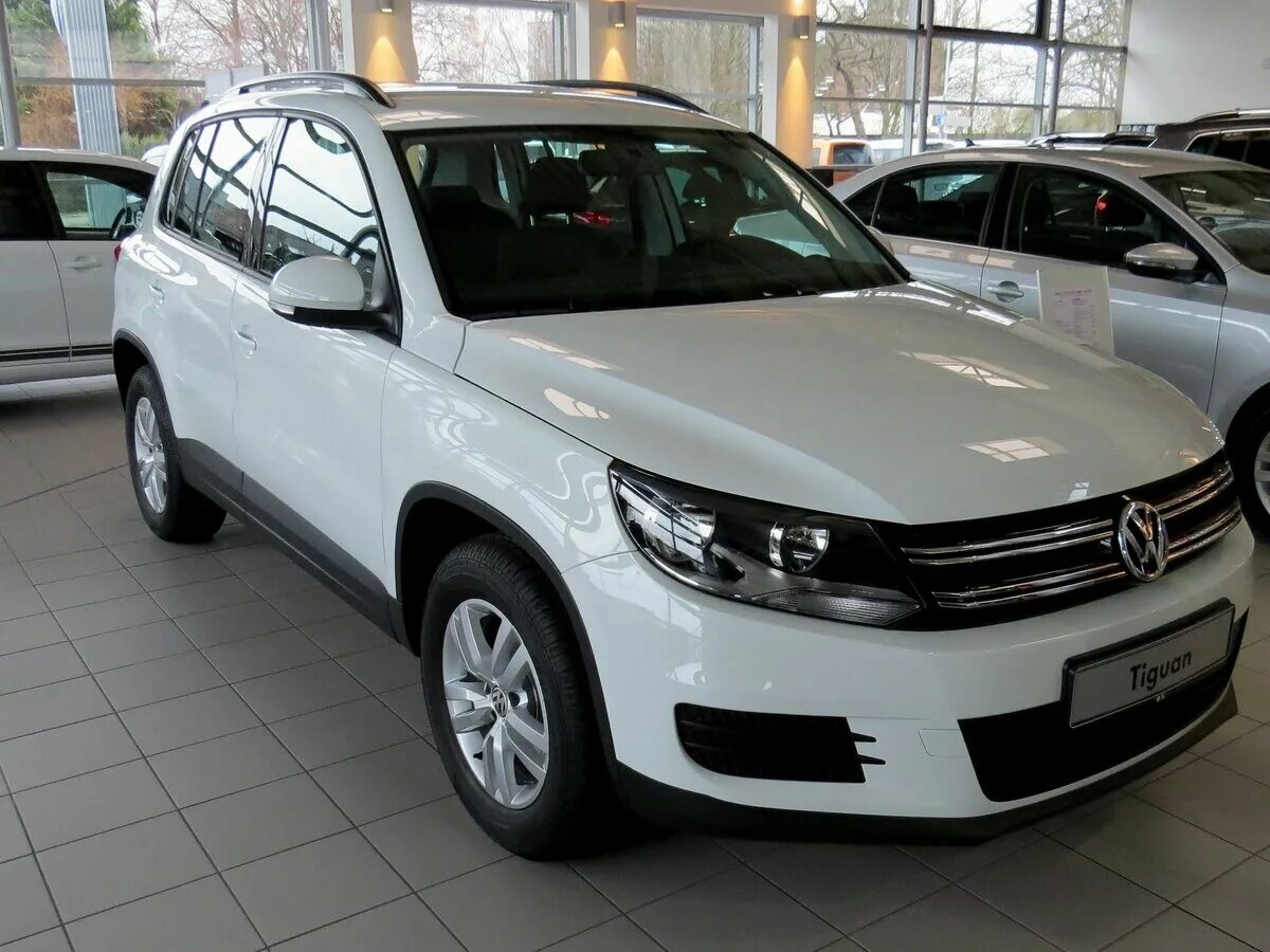 фольксваген тигуан красный 2021. Volkswagen tiguan 1. фольксваген тигуан 1. 4. фольксваген тигуан 2009.