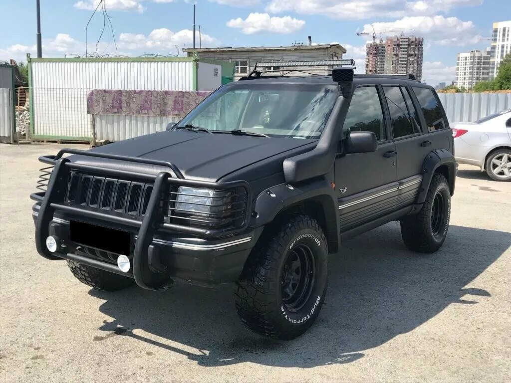 Внедорожники б у россия. Jeep Grand Cherokee ZJ 5.2. Jeep Grand Cherokee ZJ 5.2 Offroad. Jeep Grand Cherokee 1994 5.2. Jeep Grand Cherokee 1993 черный.