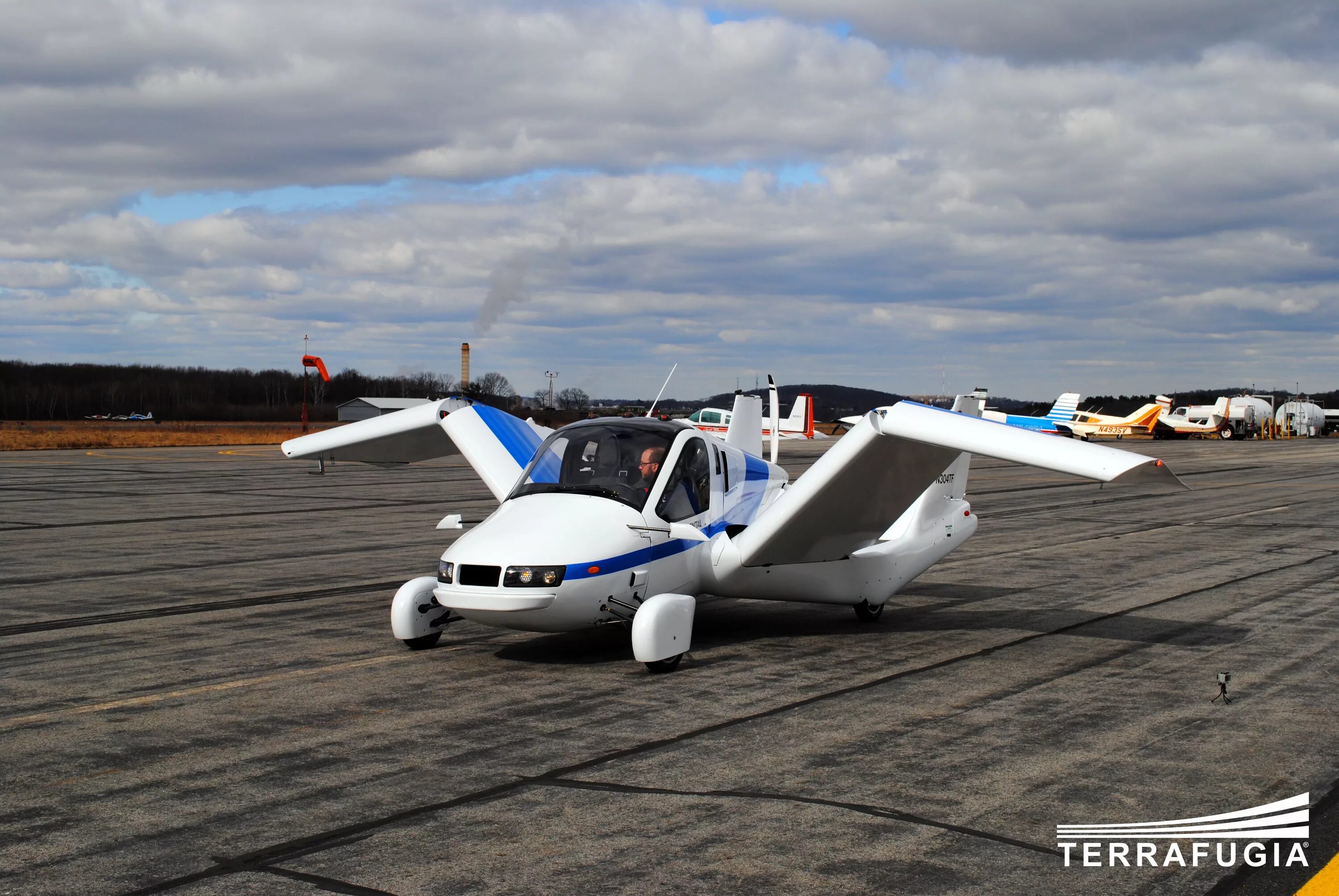 Летающие автомобили Terrafugia TF-X. Террафуджия транзишн. Летающий автомобиль Террафуджия. Летающие машины Terrafugia Transition.