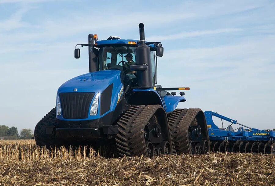 New holland t. Трактор Нью Холланд т9. Трактор Нью Холланд 9. New Holland t9 700. Трактора гусеничные Нью Холланд.