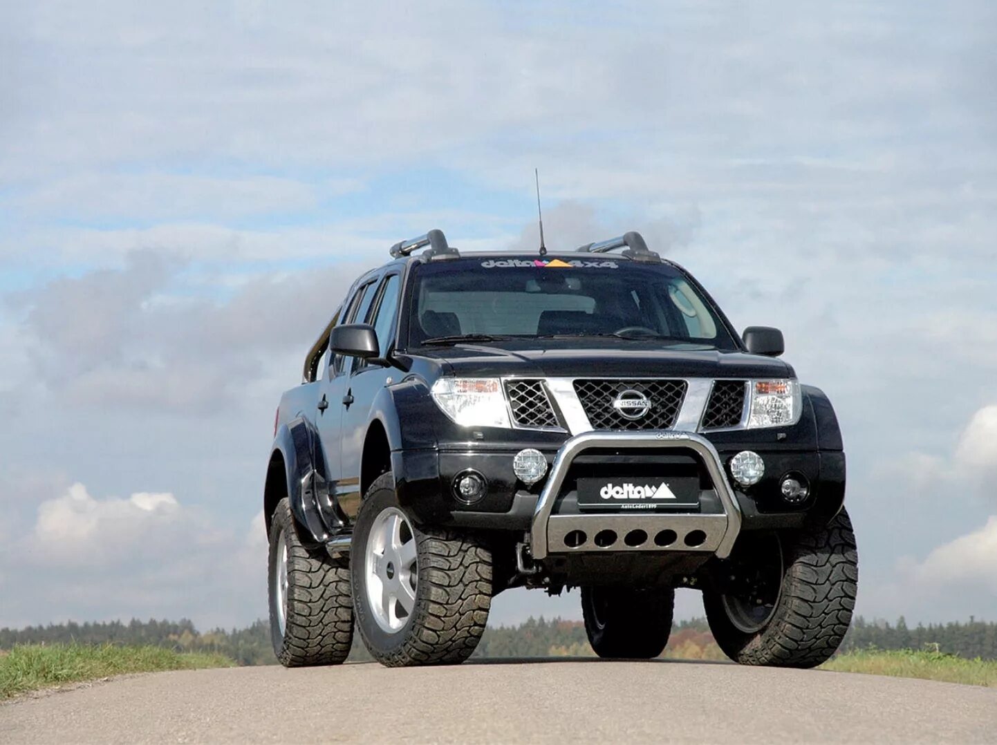 Лучший кроссовер полный привод. Ниссан Навара про 4х4. Nissan Navara d40. Nissan 4x4. Nissan Navara 4×4.