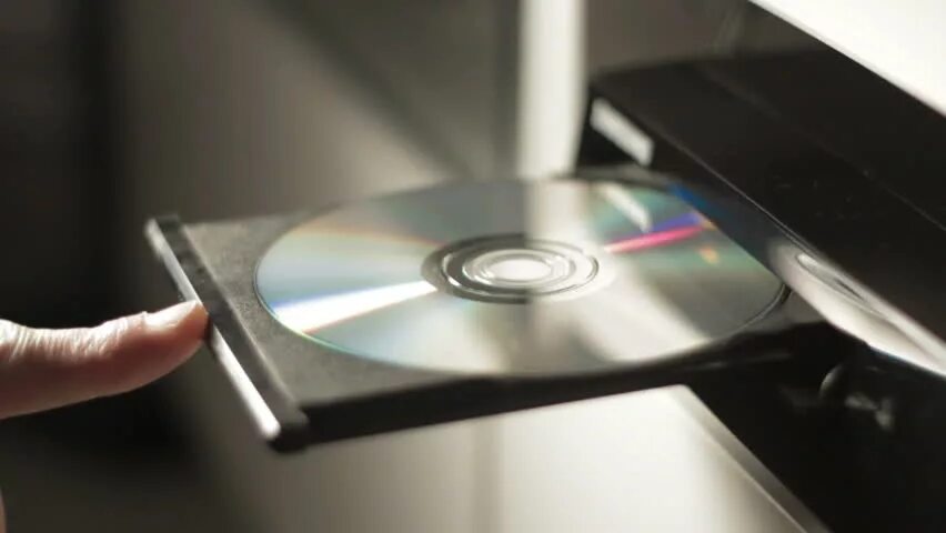 Insert disc. No disc. insert cd. . find similar clips stock footage.