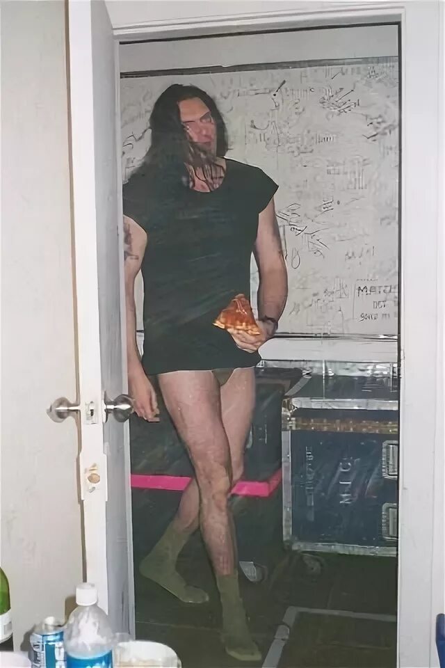 Pete, in his underpants and socks, eating pizza. Awesome. Pe