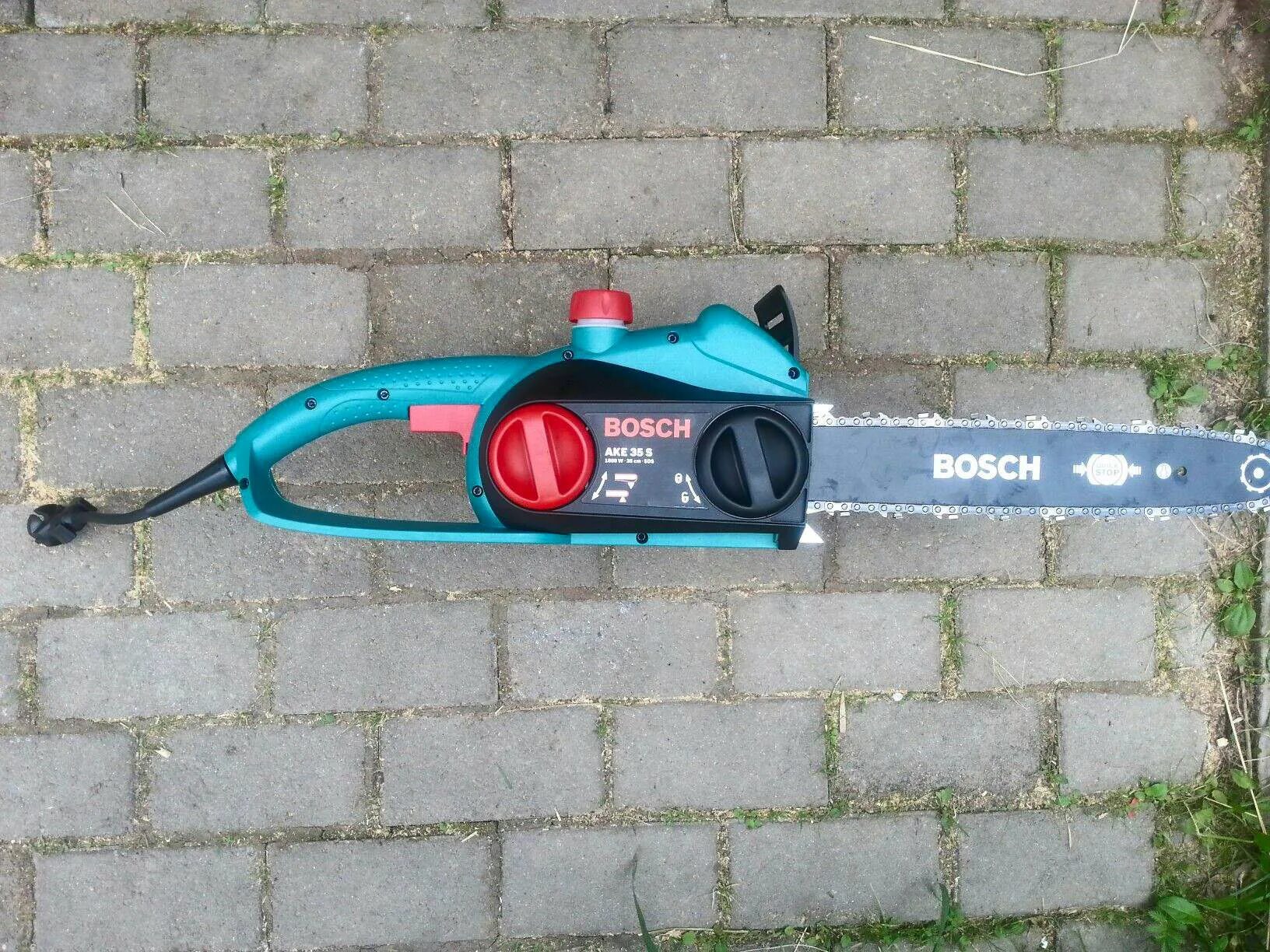 Купить bosch 35. Bosch ake 35 s. Пила Bosch ake 35s. Электропила бош аке 35. Цепная пила Bosch ake 35 s.