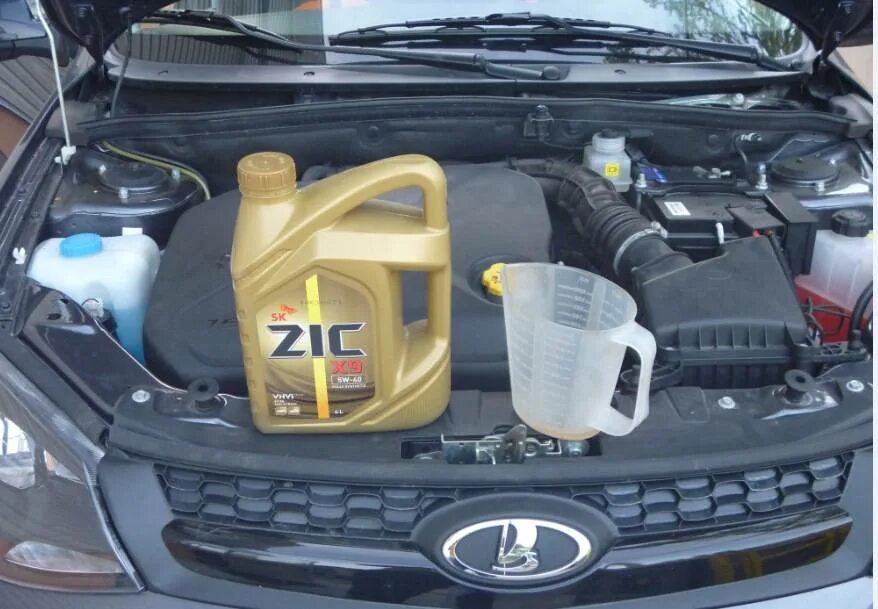 6 16v. Моторное масло для ларгус 1. Лада ларгус 16 кл слив масла. Масло двс ларгус 16 клапанов. Как поменять масло ларгус.