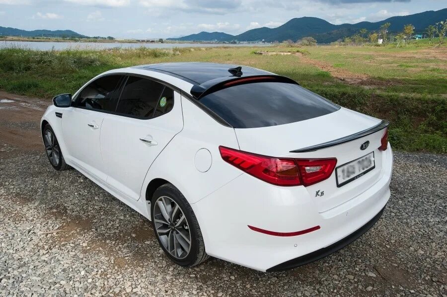 Киа к5 с пробегом купить. Kia k5 2011. Kia k5 2013. Kia k5 2012. Спойлер Kia Optima 2013.