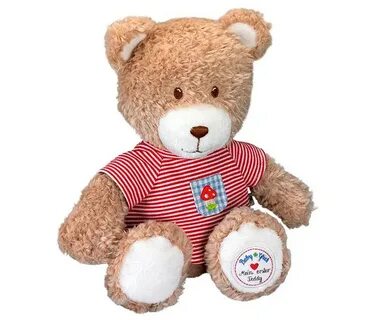 Игрушка медведь играет