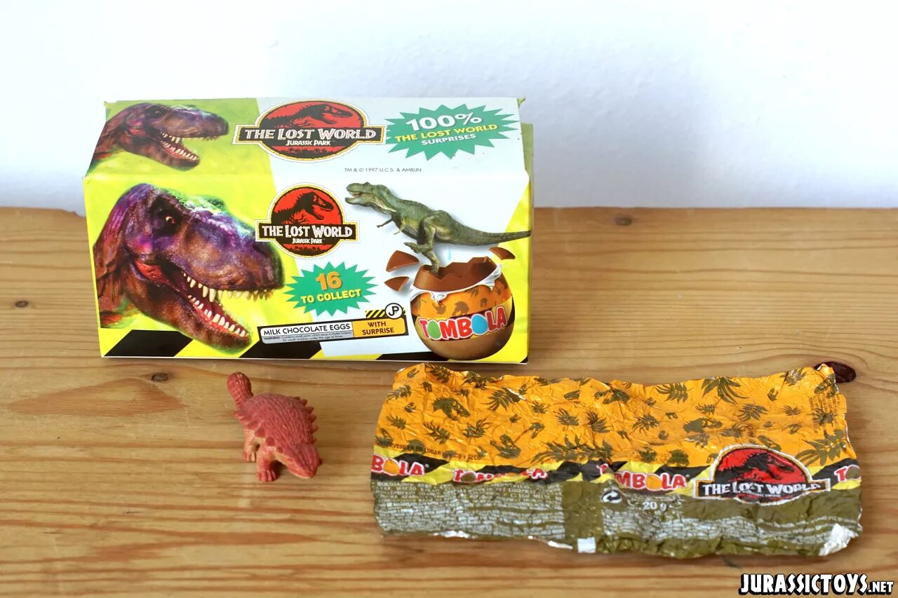 Подарок динозавр с конфетами. Шоколадное яйцо jurassic park. фигурки динозавров 90-х годов. динозавры из шоколадных яиц 90-х. динозавры томбола шоколадные яйца.