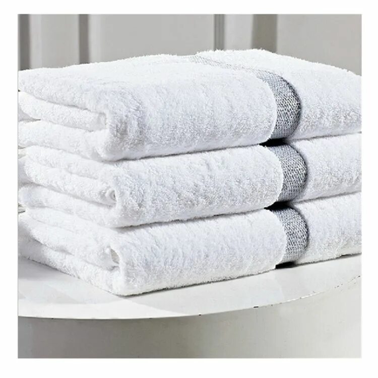 Полотенца нужно менять. Белое полотенце. Полотенце махровое белый. Стопка полотенец. Банное полотенце.