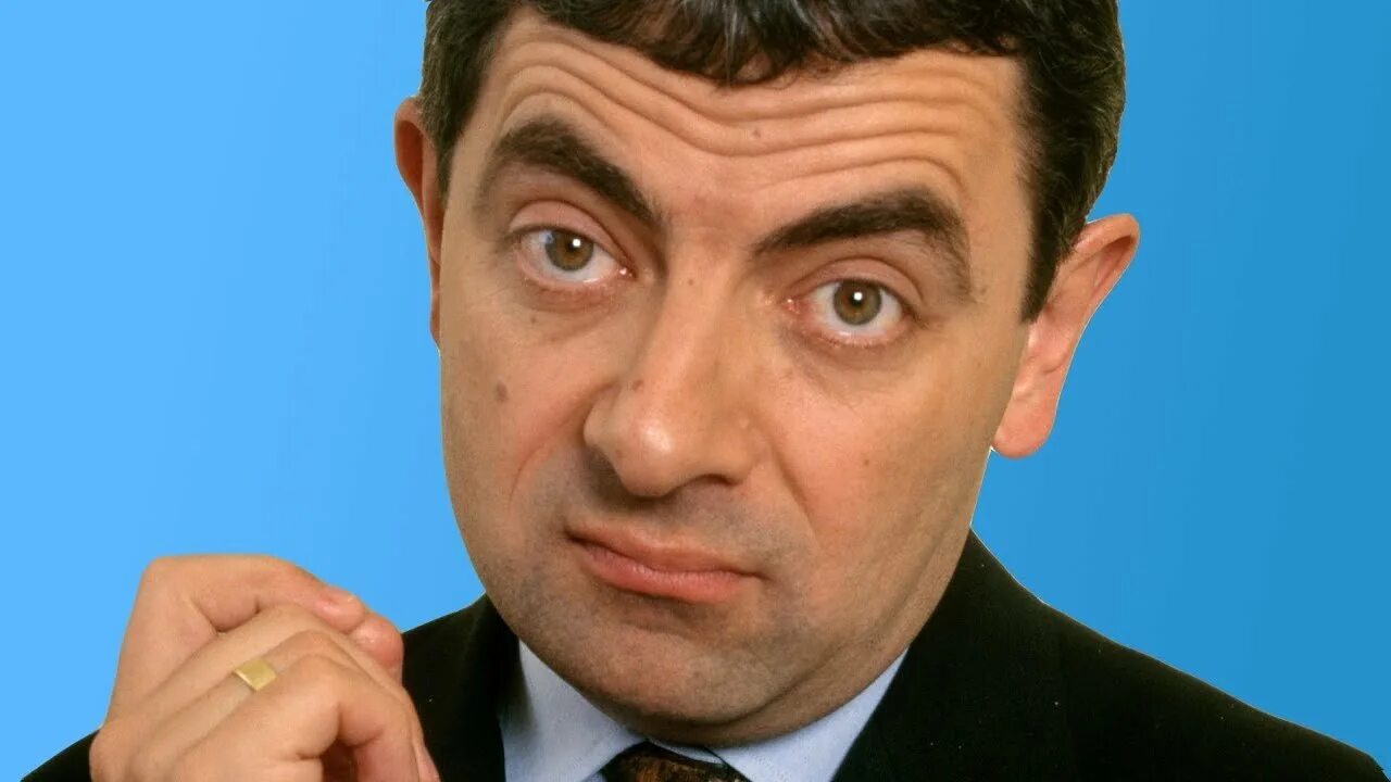Бин это. Мистер Бин. Орландо Мангини Мистер Бин. Rowan Atkinson. Роуэн Аткинсон не в комедии.