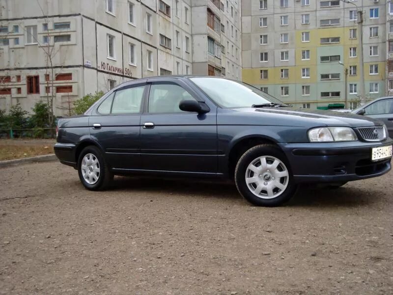 Ниссан санни годы выпуска. Nissan Sunny 1999. Ниссан Санни 1999г. Ниссан Санни 1999 черный. Ниссан Санни синий 1999.