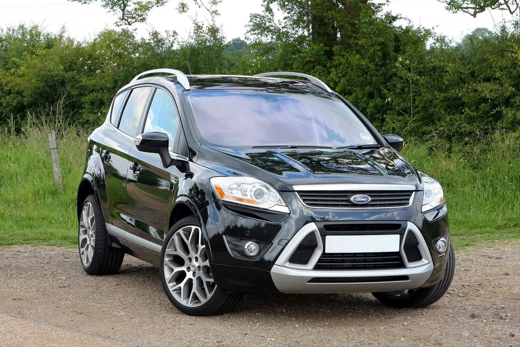 Какая куга лучше. Ford Kuga 1. Ford Kuga 2008. Ford Kuga 2 2013. Форд Куга 2 2013.