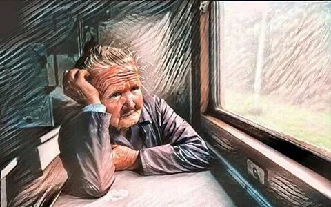 Дедушка смотрит в окно